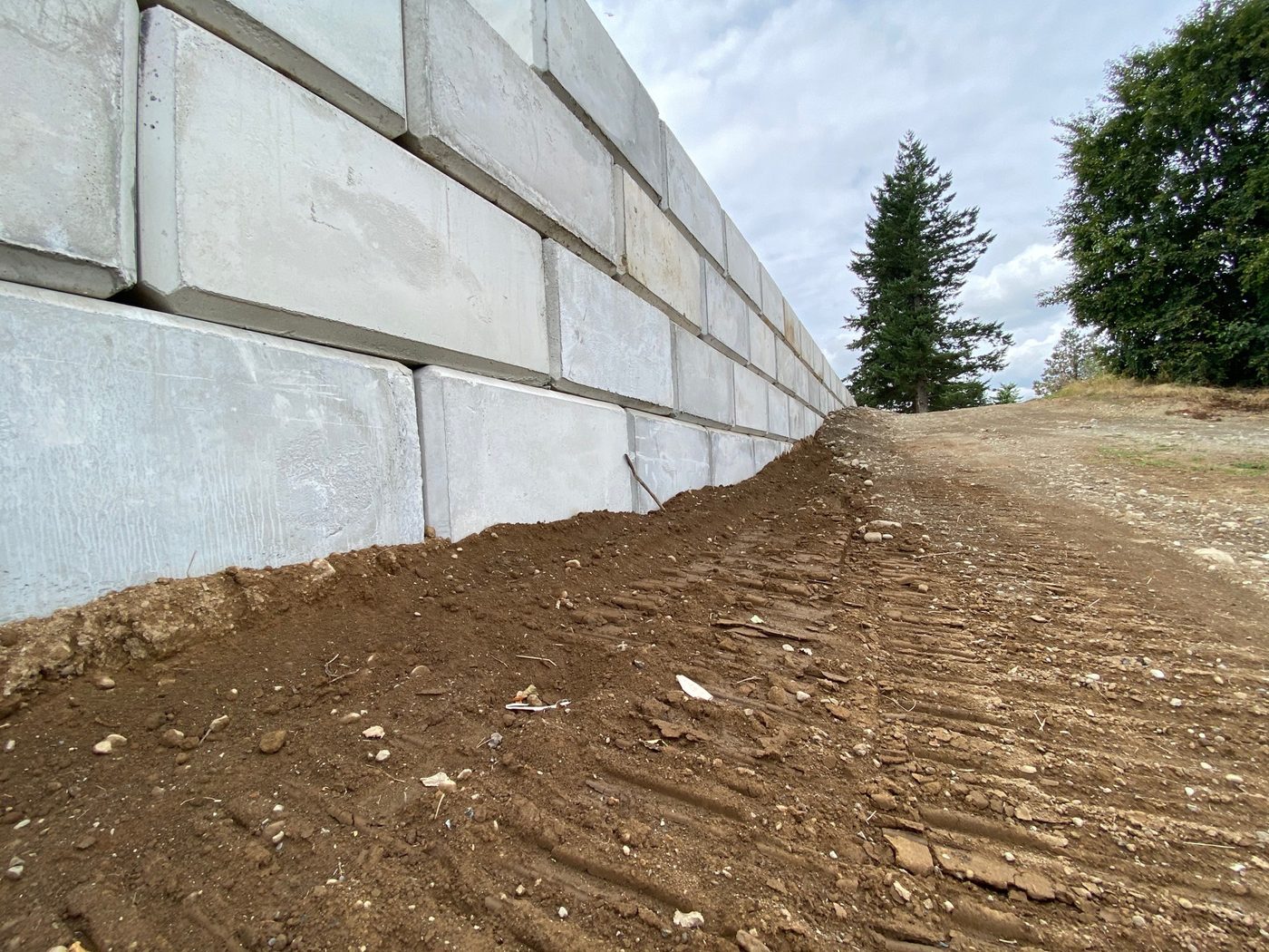 Interlocking-block retaining wall on a job site